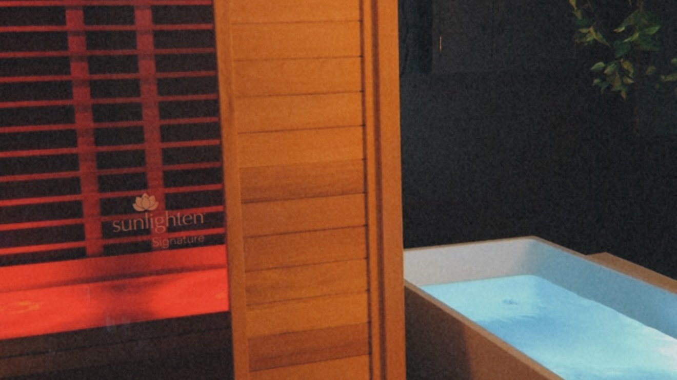 The infrared sauna and cold plunge tub in the private session room at Studio 303