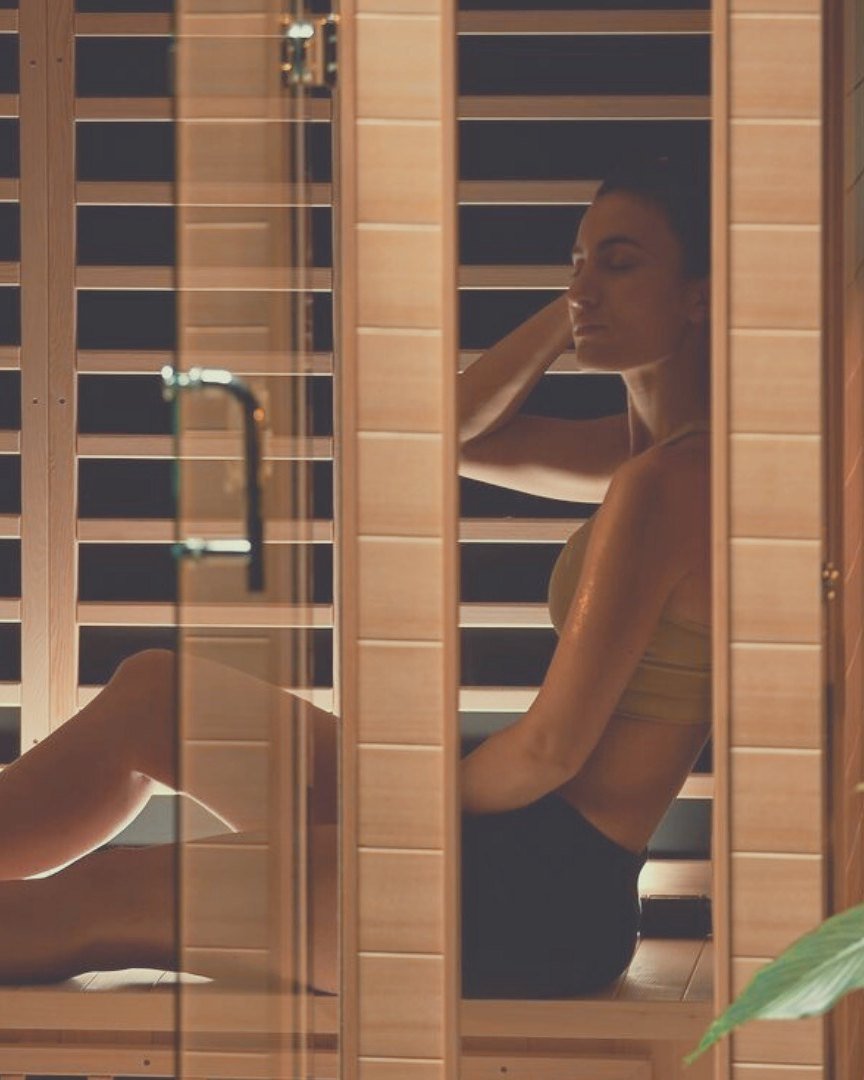 A guest in the cedar-lined infrared sauna